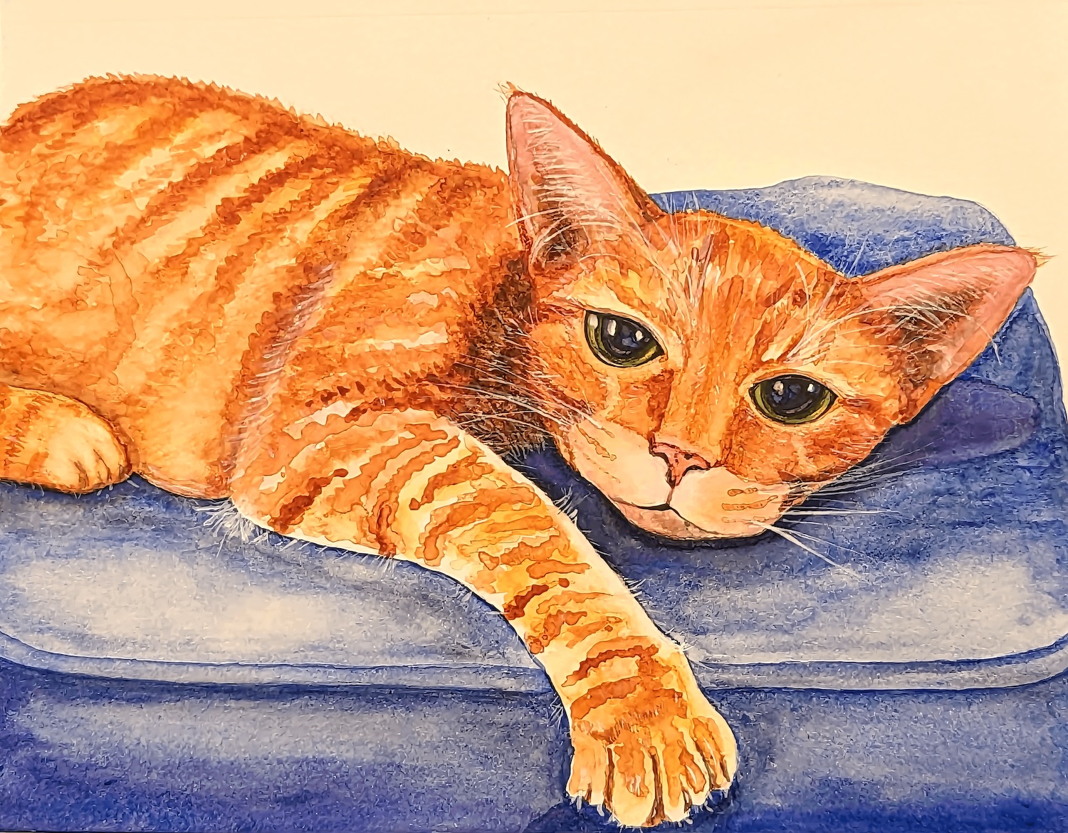 Original orange tabby cat watercolor painting; cozy pet illustration of a ginger cat resting on a blue cushion with detailed fur textures.